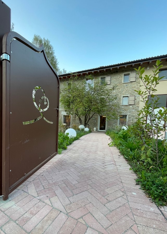 Open gate, entrance to large building