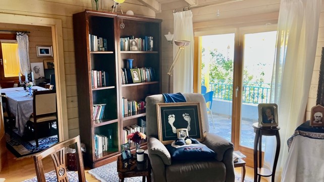 Armchair and bookshelf in Moksha Kutir